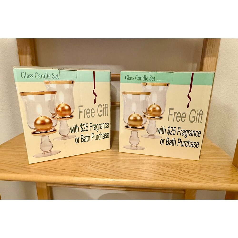 Two Sets of glass hurricane ball candle holder set